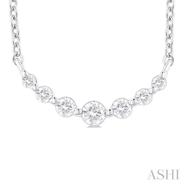 1/8 ctw Petite Smile Graduated Round Cut Diamond Necklace in Sterling Silver