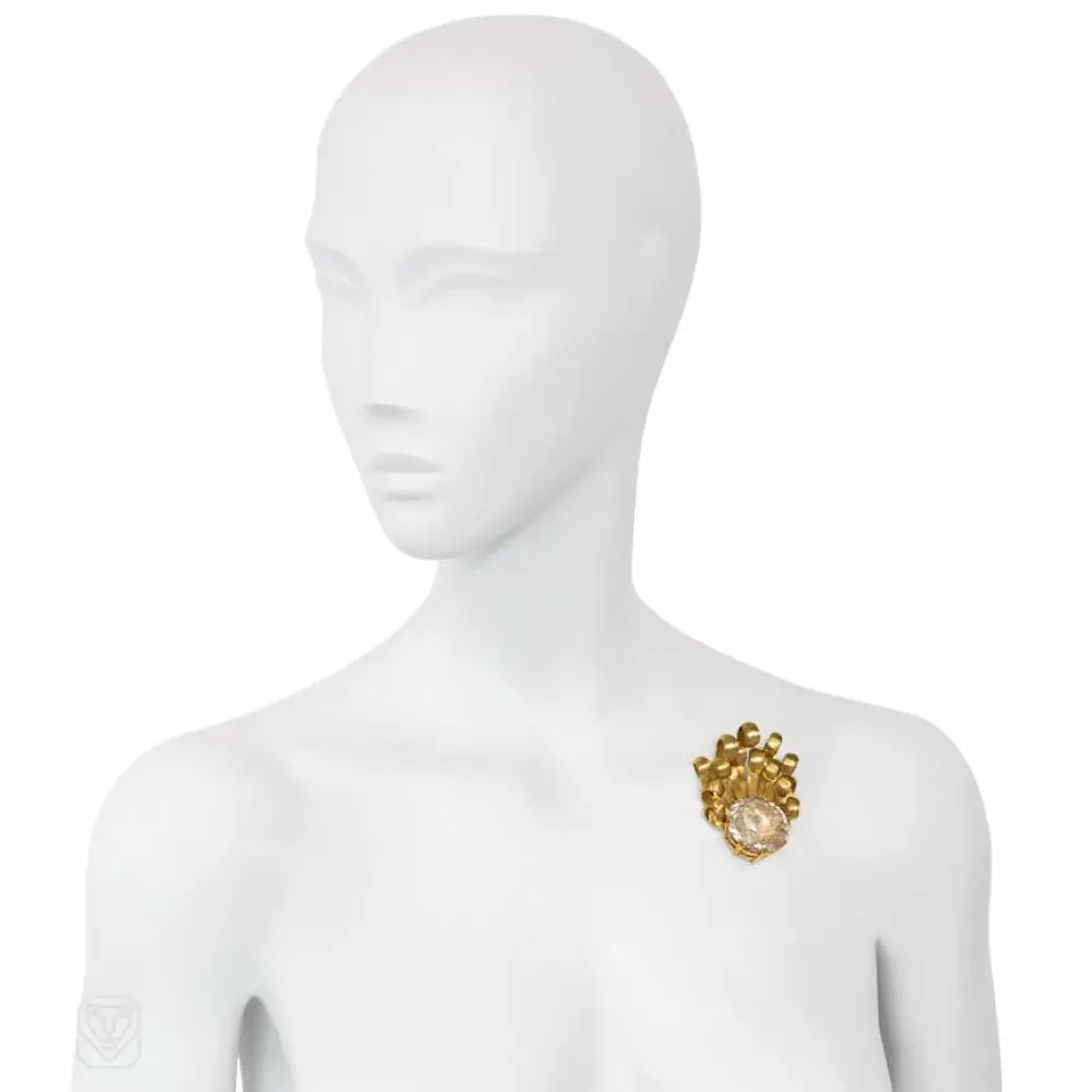 Gold and topaz brooch