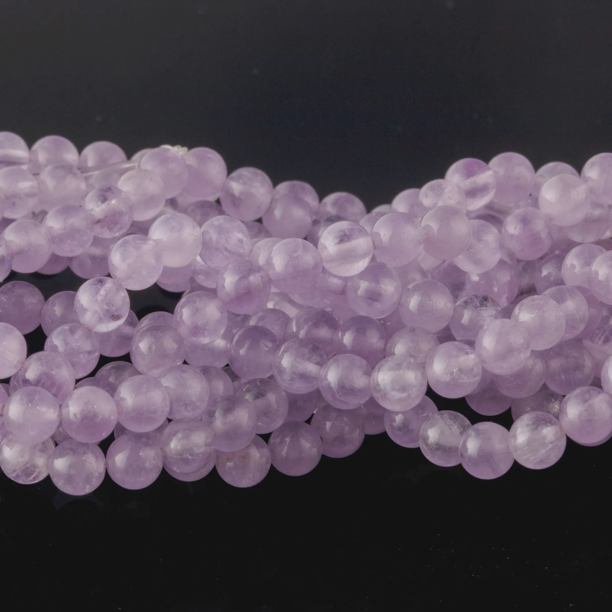 Old stock natural light lavender amethyst 6mm smooth clear round beads.16 inch strand. b4-ame228